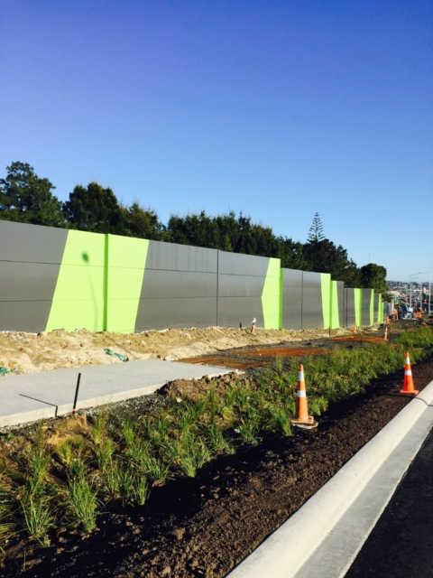 Noise blocking panels line a major road