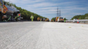 A concrete road under construction