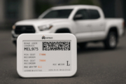Photo of Road User Charges licence with work pickup vehicle in the background