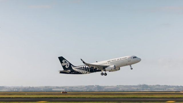 Air NZ plane taking off on a fine day